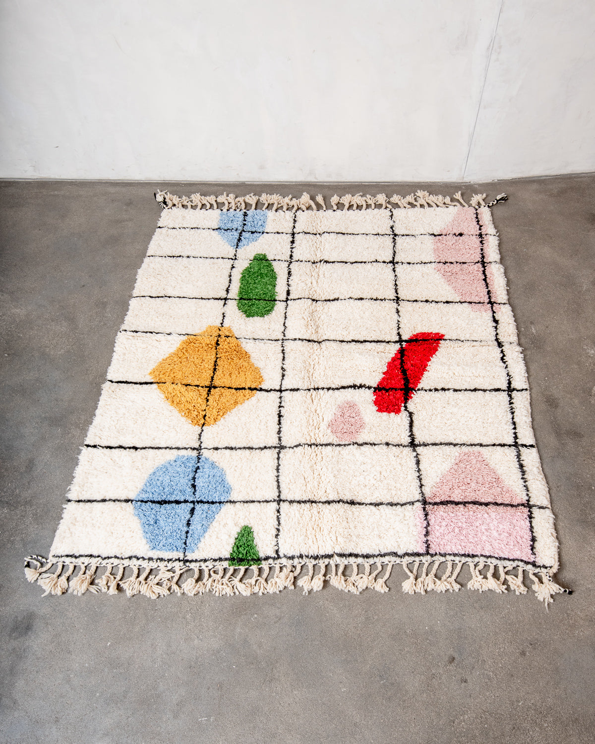 Modern, designer, handcrafted Berber rug from Morocco. Beniourain carpet with beautiful colours and patterns and fluffy wool texture.
